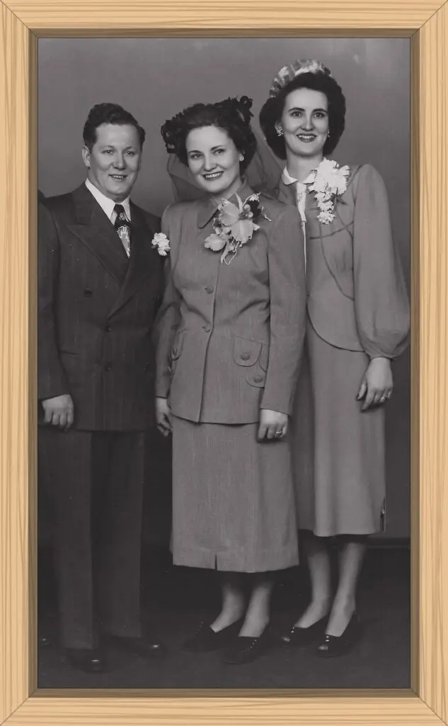 wedding picture of my father, mother, and aunt, who was my mom's maid of honor
