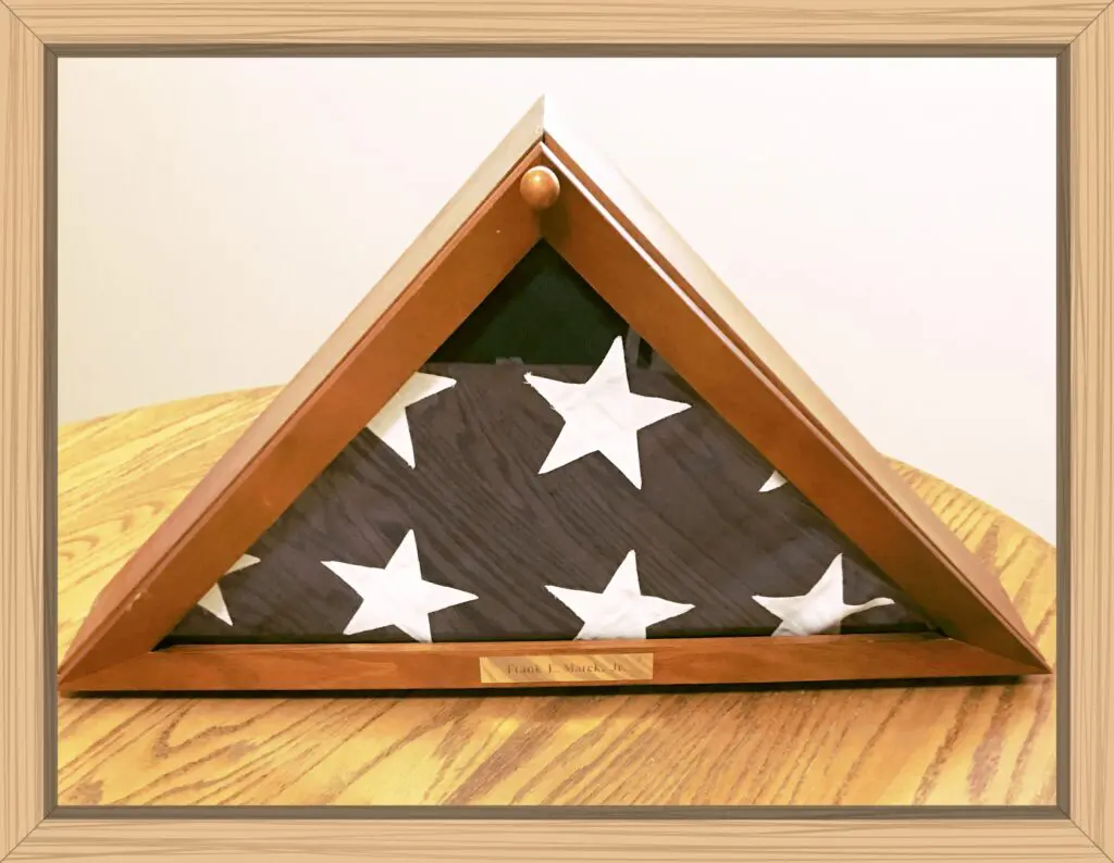 My dad's flag that is framed and on display in my home