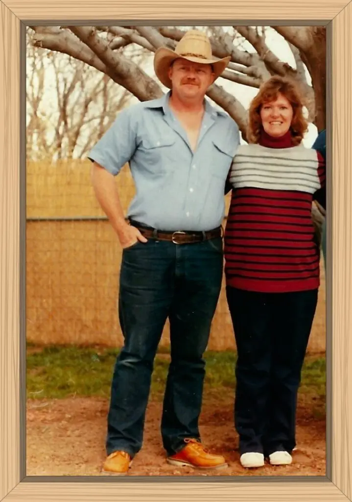 Pete and I are standing in the front yard of our mobile home. I am about eight months pregnant.