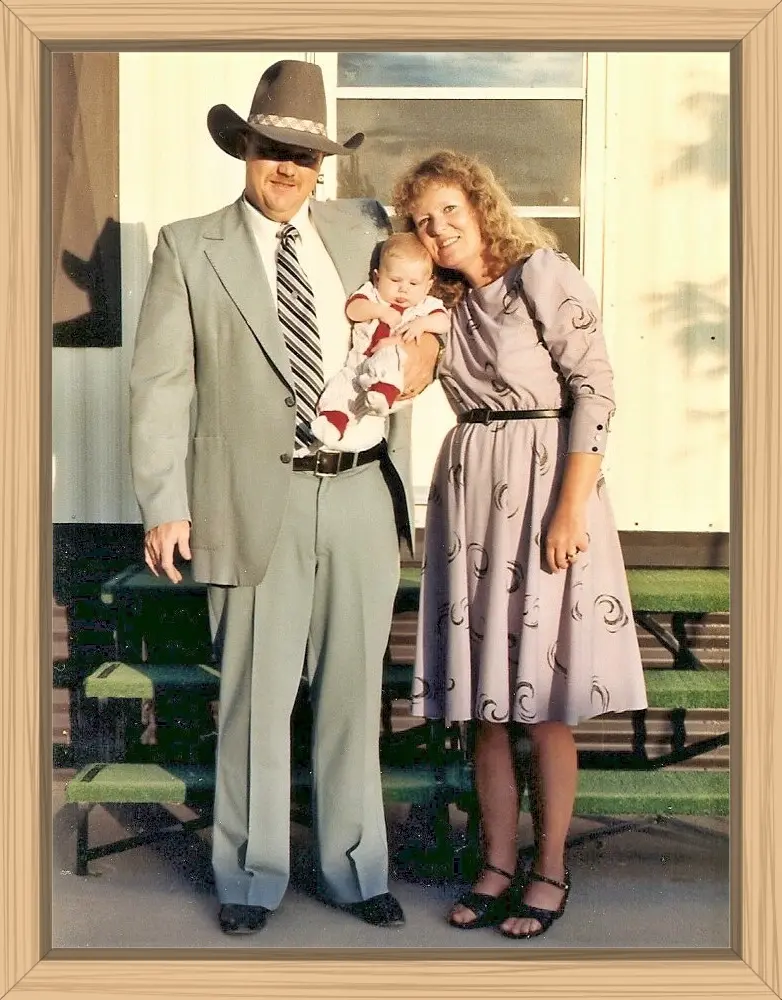 The three of us all dressed up standing together in front of our mobile home. Pete has on his good luck Stetson.