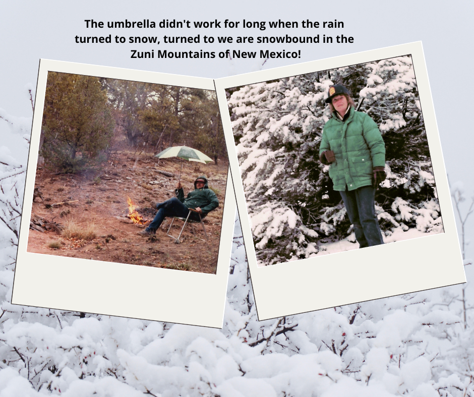 Pete sitting by the campfire holding an umbrella. Me surrounded by snow not long after the temperature drop caused the rain to become snow.