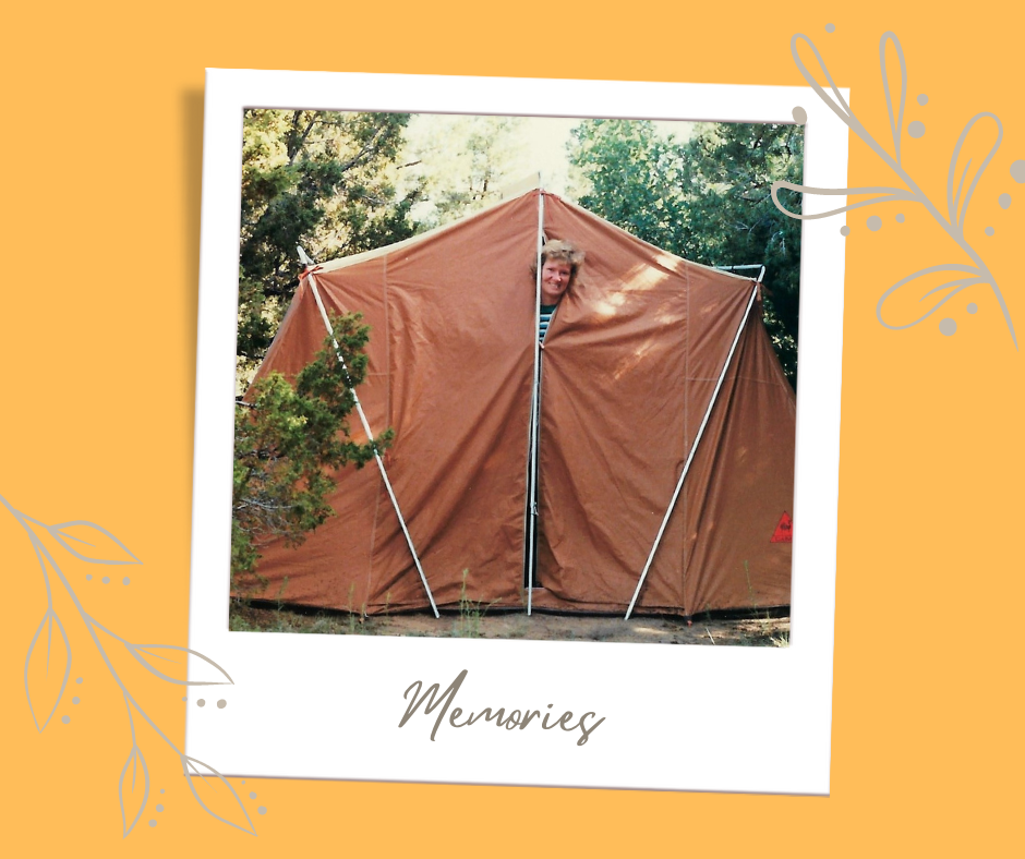 Me with just my head sticking out from our pitched tent.