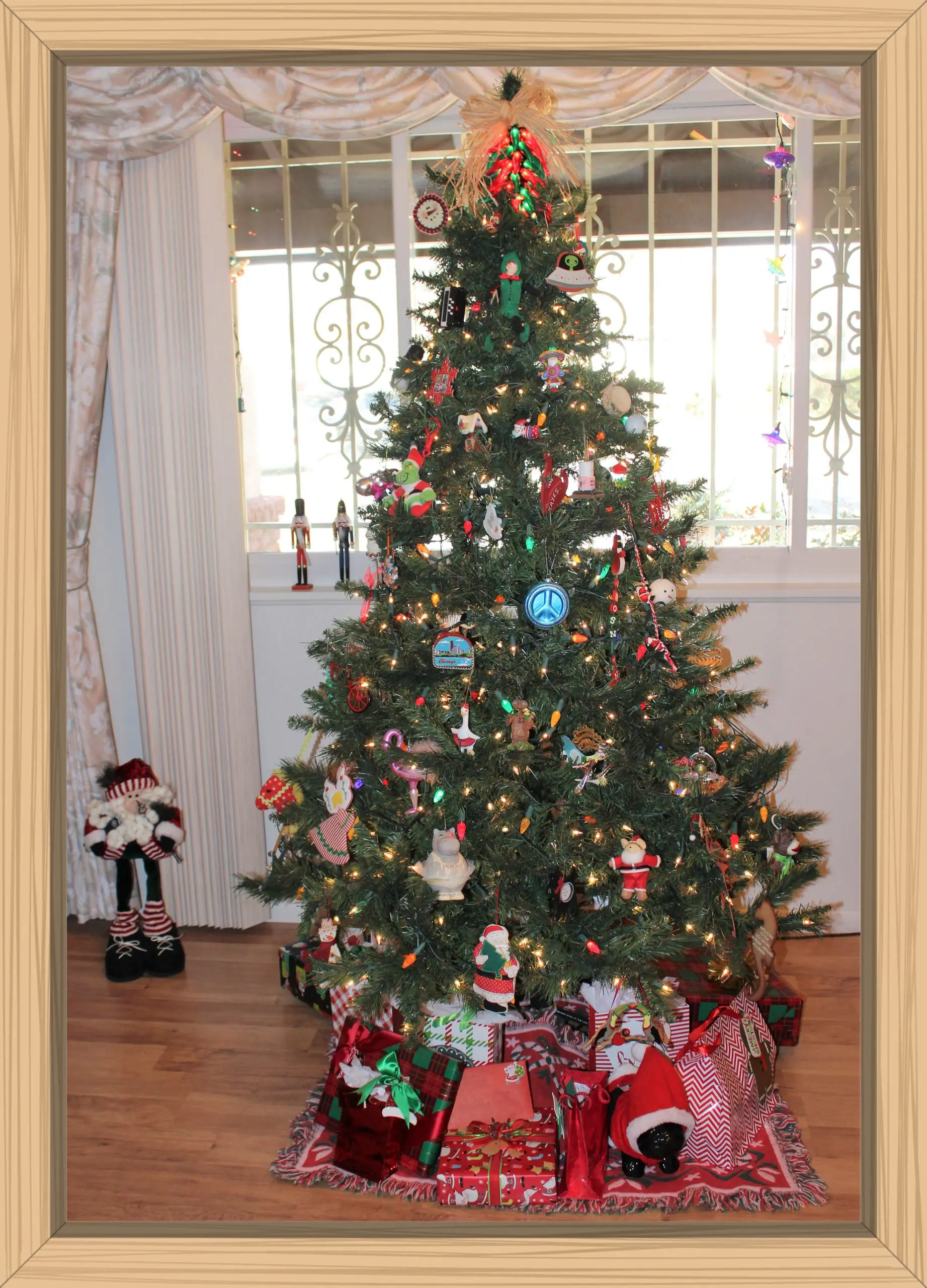 In addition to Hayes' small photo ornament tree, I also put up a large Christmas tree so I can hang many more ornaments.