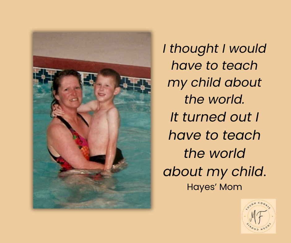 Me holding Hayes in the pool where he was taking swimming lesson. We were having a fun time together.