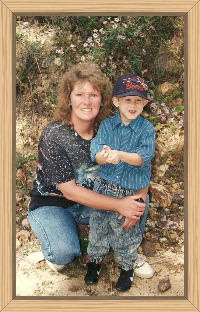 I included this phot with me knelt down hugging Hayes with his Chicago Bears hat on to show how small he was at five and one-half years old when he started first grade.