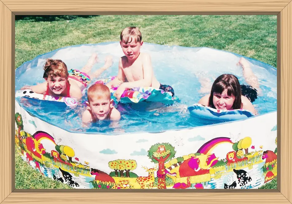 Hayes and cousins cooling off in our backyard pool from the summer heat.