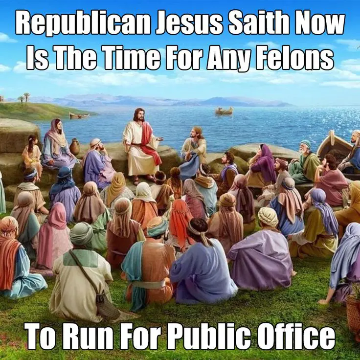 Jesus is talking to a large group of people sitting and listening to him.