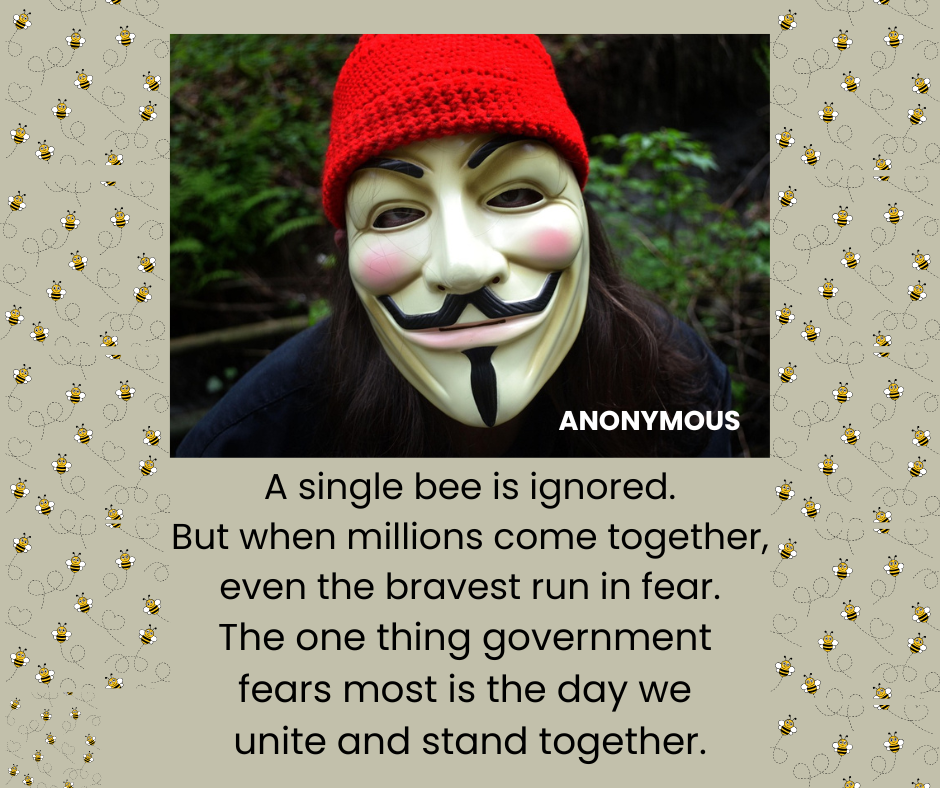 An individual wearing a Guy Fawkes mask, which became a symbol for Anonymous.